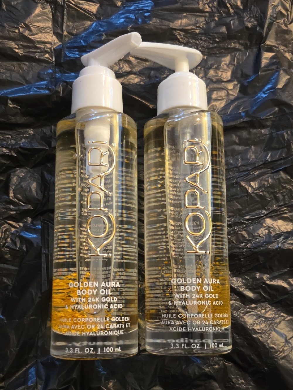 Kopari Golden Aura Body Oil Duo — Clear Bottle with Gold Flakes